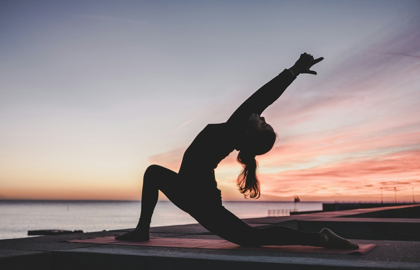 Outdoor yoga stretch — everyday movement context
